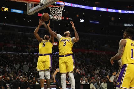 Feb 3, 2022; Los Angeles, California, USA; Los Angeles Lakers forward Anthony Davis (3) rebounds a ball during the third quarter against the Los Angeles Clippers at Crypto.com Arena. The Clippers won 111-110. Mandatory Credit: Kiyoshi Mio-USA TODAY Sports