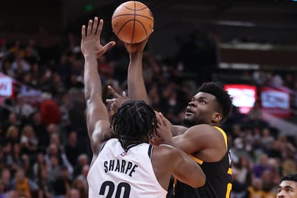 Feb 4, 2022; Salt Lake City, Utah, USA; Utah Jazz center Udoka Azubuike (20) shoots the ball over Brooklyn Nets center Day'Ron Sharpe (20) in the fourth quarter at Vivint Arena. Mandatory Credit: Rob Gray-USA TODAY Sports