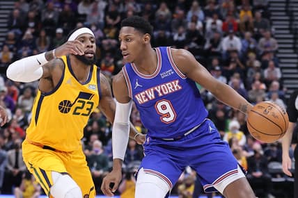 Feb 7, 2022; Salt Lake City, Utah, USA; New York Knicks guard RJ Barrett (9) dribbles the ball defended by Utah Jazz forward Royce O'Neale (23) in the first quarter at Vivint Arena. Mandatory Credit: Rob Gray-USA TODAY Sports
