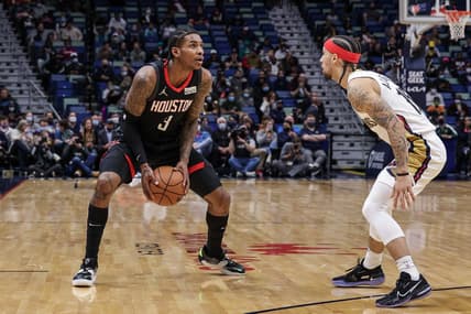 Feb 8, 2022; New Orleans, Louisiana, USA;  New Orleans Pelicans guard Jose Alvarado (15) guards Houston Rockets guard Kevin Porter Jr. (3) during the first half at the Smoothie King Center. Mandatory Credit: Stephen Lew-USA TODAY Sports