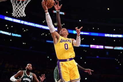 Feb 8, 2022; Los Angeles, California, USA; Los Angeles Lakers guard Russell Westbrook (0) moves to the basket against the Milwaukee Bucks during the first half at Crypto.com Arena. Mandatory Credit: Gary A. Vasquez-USA TODAY Sports