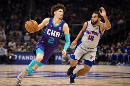 Feb 11, 2022; Detroit, Michigan, USA; Charlotte Hornets guard LaMelo Ball (2) gets defended by Detroit Pistons guard Cory Joseph (18) during the first quarter at Little Caesars Arena. Mandatory Credit: Raj Mehta-USA TODAY Sports