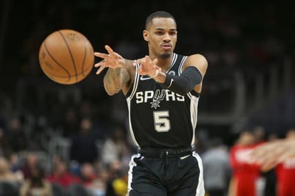 Feb 11, 2022; Atlanta, Georgia, USA; San Antonio Spurs guard Dejounte Murray (5) passes the ball against the Atlanta Hawks in the first quarter at State Farm Arena. Mandatory Credit: Brett Davis-USA TODAY Sports