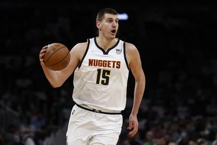 Feb 11, 2022; Boston, Massachusetts, USA; Denver Nuggets center Nikola Jokic (15) brings the ball up court against the Boston Celtics during the first quarter at TD Garden. Mandatory Credit: Winslow Townson-USA TODAY Sports