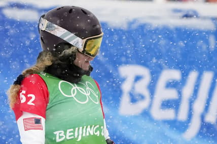Feb 12, 2022; Zhangjiakou, China; Lindsey Jacobellis (USA) competes in the mixed snowboard cross during the Beijing 2022 Olympic Winter Games at Genting Snow Park. Mandatory Credit: Jack Gruber-USA TODAY Sports
