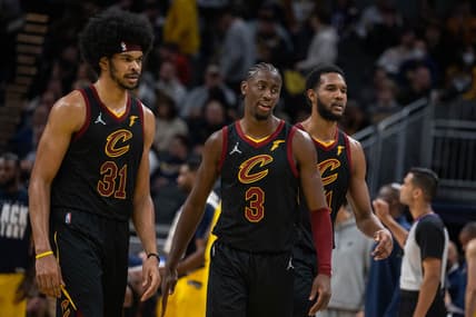 Feb 11, 2022; Indianapolis, Indiana, USA; Cleveland Cavaliers center Jarrett Allen (31), guard Caris LeVert (3), and center Evan Mobley (4) look on in the second half against the Indiana Pacers at Gainbridge Fieldhouse. Mandatory Credit: Trevor Ruszkowski-USA TODAY Sports