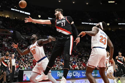 Feb 12, 2022; Portland, Oregon, USA;  Portland Trail Blazers center Jusuf Nurkic (27) battles for a rebound during the first half against New York Knicks forward Julius Randle (30) at Moda Center. Mandatory Credit: Troy Wayrynen-USA TODAY Sports