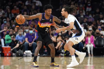 Feb 12, 2022; Phoenix, Arizona, USA; Phoenix Suns guard Elfrid Payton (2) dribbles against Orlando Magic guard Cole Anthony (50) during the first half at Footprint Center. Mandatory Credit: Joe Camporeale-USA TODAY Sports