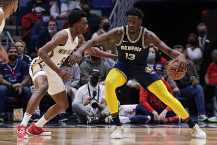 Feb 15, 2022; New Orleans, Louisiana, USA;  Memphis Grizzlies forward Jaren Jackson Jr. (13) dribbles against New Orleans Pelicans forward Herbert Jones (5) during the first half at the Smoothie King Center. Mandatory Credit: Stephen Lew-USA TODAY Sports