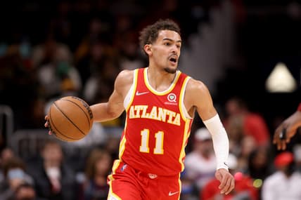 Feb 15, 2022; Atlanta, Georgia, USA; Atlanta Hawks guard Trae Young (11) drives during the second half against the Cleveland Cavaliers at State Farm Arena. Mandatory Credit: Jason Getz-USA TODAY Sports