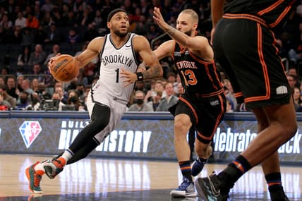 Feb 16, 2022; New York, New York, USA; Brooklyn Nets forward Bruce Brown (1) drives to the basket against New York Knicks guard Evan Fournier (13) during the first quarter at Madison Square Garden. Mandatory Credit: Brad Penner-USA TODAY Sports