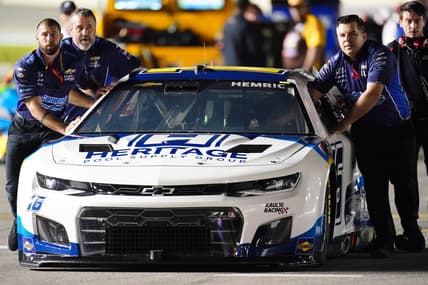 Feb 16, 2022; Daytona, FL, USA; NASCAR Cup Series driver Daniel Hemric (16) crew pushes his car down pit road during qualifying for the Daytona 500 at Daytona International Speedway. Mandatory Credit: John David Mercer-USA TODAY Sports