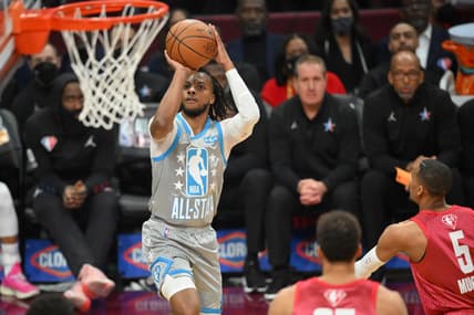 Feb 20, 2022; Cleveland, Ohio, USA; Team LeBron guard Darius Garland (10) shoots against Team Durant guard Dejounte Murray (5) in the second quarter during the 2022 NBA All-Star Game at Rocket Mortgage FieldHouse. Mandatory Credit: David Richard-USA TODAY Sports