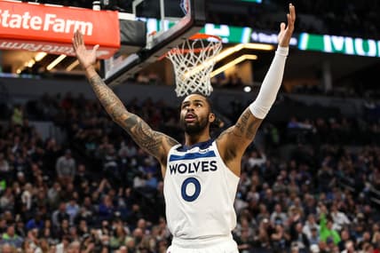 Feb 24, 2022; Minneapolis, Minnesota, USA; Minnesota Timberwolves guard D'Angelo Russell (0) pumps up the crowd against the Memphis Grizzlies in the third quarter at Target Center. Mandatory Credit: David Berding-USA TODAY Sports