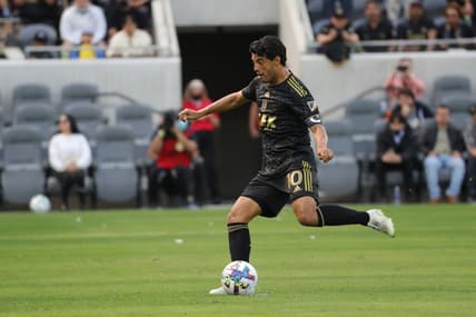 Feb 26, 2022; Los Angeles, California, USA; Los Angeles FC forward Carlos Vela (10) scores a penalty kick in the first half against the Colorado Rapids at Banc of California Stadium. Mandatory Credit: Kiyoshi Mio-USA TODAY Sports