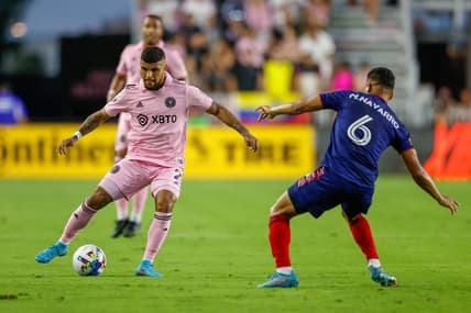 Feb 26, 2022; Fort Lauderdale, Florida, USA; Inter Miami defender DeAndre Yedlin (2) looks to pass the ball defended by Chicago Fire defender Miguel Angel Navarro (6) in the first half at Inter Miami CF Stadium. Mandatory Credit: Nathan Ray Seebeck-USA TODAY Sports