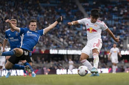 February 26, 2022; San Jose, California, USA; New York Red Bulls midfielder Omir Fernandez (21) scores a goal against the San Jose Earthquakes during the second half at PayPal Park. Mandatory Credit: Kyle Terada-USA TODAY Sports
