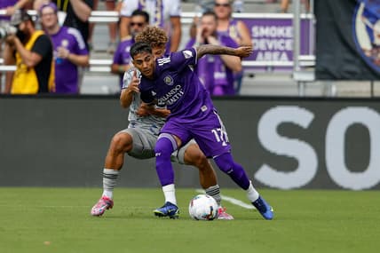 Feb 27, 2022; Orlando, Florida, USA;  Orlando City midfielder Facundo Torres (17) keeps possession during a match against CF Montr  al mat Orlando City Stadium. Mandatory Credit: Nathan Ray Seebeck-USA TODAY Sports