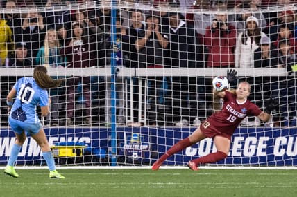 Dec 8, 2019; San Jose, CA, USA; Stanford Cardinal goalkeeper Katie Meyer (19) dives for a penalty kick by North Carolina Tar Heels forward/Midfielder Rachel Jones (10) in the College Cup championship match at Avaya Stadium. Mandatory Credit: John Hefti-USA TODAY Sports