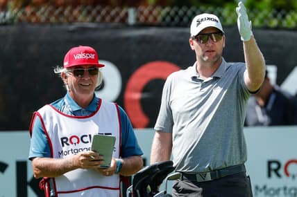 Ryan Brehm talks to his caddie before teeing off on the eighth in the second round of the Rocket Mortgage Classic at the Detroit Golf Club in Detroit on Friday, July 2, 2021.