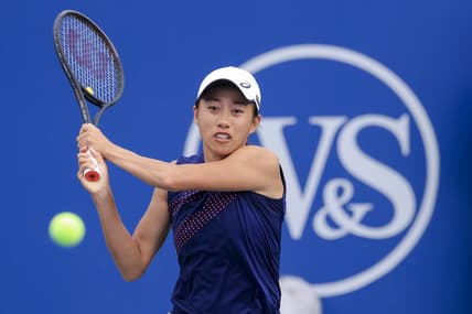 Aug 15, 2021; Mason, OH, USA; Shuai Zhang (CHN) returns a shot against Marie Bouzkova (CZE) during the Western and Southern Open tennis tournament at Lindner Family Tennis Center. Mandatory Credit: Aaron Doster-USA TODAY Sports