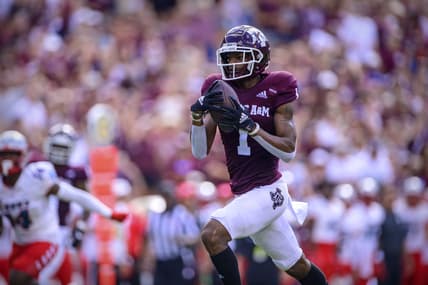 Sep 18, 2021; College Station, Texas, USA; Texas A&M Aggies wide receiver Demond Demas (1) scores a touchdown during the game between the Texas A&M Aggies and the New Mexico Lobos at Kyle Field. Mandatory Credit: Jerome Miron-USA TODAY Sports