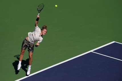 Oct 9, 2021; Indian Wells, CA, USA; Sebastian Korda (USA) serves against Frances Tiafoe (USA) at Indian Wells Tennis Garden. Mandatory Credit: Orlando Ramirez-USA TODAY Sports