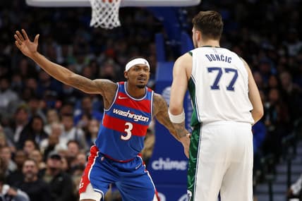 Nov 27, 2021; Dallas, Texas, USA; Washington Wizards guard Bradley Beal (3) guards Dallas Mavericks guard Luka Doncic (77) in the third quarter at American Airlines Center. Mandatory Credit: Tim Heitman-USA TODAY Sports