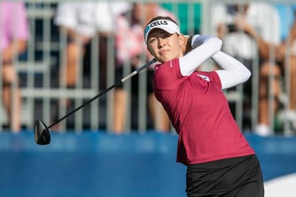 Dec 16, 2021; Orlando, Florida, USA; Nelly Korda plays her shot from the first tee during a pro-am round of the PNC Championship golf tournament at Grande Lakes Orlando Course. Mandatory Credit: Jeremy Reper-USA TODAY Sports