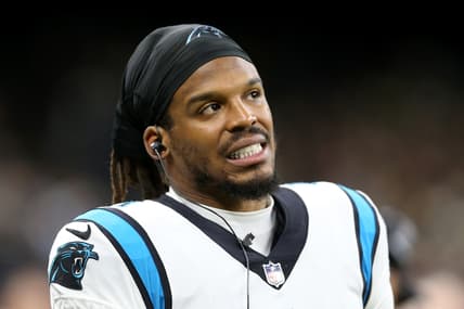 Jan 2, 2022; New Orleans, Louisiana, USA; Carolina Panthers quarterback Cam Newton (1) on the sidelines in the second quarter against the New Orleans Saints at the Caesars Superdome. Mandatory Credit: Chuck Cook-USA TODAY Sports