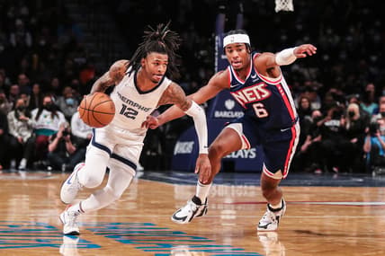 Jan 3, 2022; Brooklyn, New York, USA; Memphis Grizzlies guard Ja Morant (12) and Brooklyn Nets guard David Duke Jr. (6) at Barclays Center. Mandatory Credit: Wendell Cruz-USA TODAY Sports