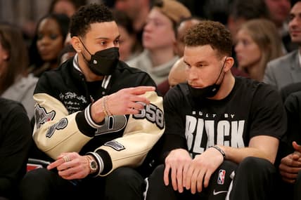 Feb 16, 2022; New York, New York, USA; Brooklyn Nets guard Ben Simmons (10) talks to forward Blake Griffin (2) on the bench during the first quarter against the New York Knicks at Madison Square Garden. Mandatory Credit: Brad Penner-USA TODAY Sports
