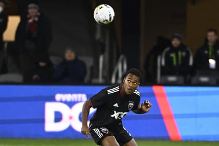 Feb 26, 2022; Washington, District of Columbia, USA; D.C. United forward Ola Kamara (9) heads the ball in the second half against the Charlotte FC  at Audi Field. Mandatory Credit: Brad Mills-USA TODAY Sports