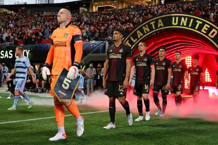 Feb 27, 2022; Atlanta, Georgia, USA; Atlanta United goalkeeper Brad Guzan (1) leads his team onto the field before the game against Sporting Kansas City at Mercedes-Benz Stadium. Mandatory Credit: Brett Davis-USA TODAY Sports