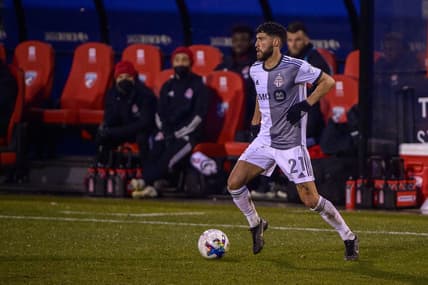 Feb 26, 2022; Frisco, Texas, USA; Toronto FC midfielder Jonathan Osorio (21) in acton during the match between FC Dallas and Toronto FC at Toyota Stadium. Mandatory Credit: Jerome Miron-USA TODAY Sports