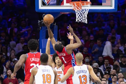 Mar 2, 2022; Philadelphia, Pennsylvania, USA; Philadelphia 76ers guard James Harden (1) is fouled while scoring against the New York Knicks during the first quarter at Wells Fargo Center. Mandatory Credit: Bill Streicher-USA TODAY Sports