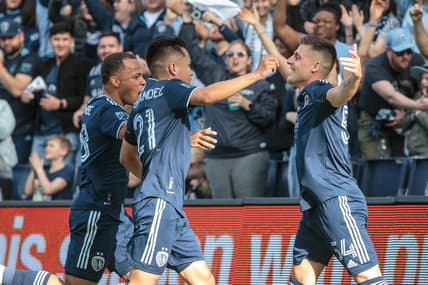 Mar 5, 2022; Kansas City, Kansas, USA; Sporting Kansas City midfielder Remi Walter (54) celebrates after scoring a goal during the second half against the Houston Dynamo at Children's Mercy Park. Mandatory Credit: William Purnell-USA TODAY Sports