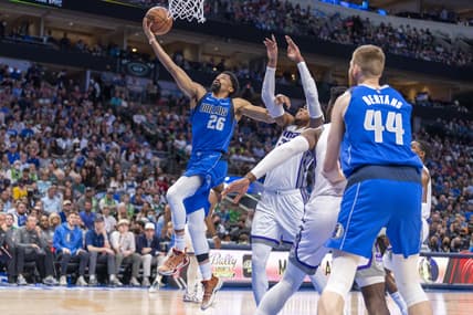 Mar 5, 2022; Dallas, Texas, USA; Dallas Mavericks guard Spencer Dinwiddie (26) drives to the basket against the Sacramento Kings during the second quarter at the American Airlines Center. Mandatory Credit: Jerome Miron-USA TODAY Sports