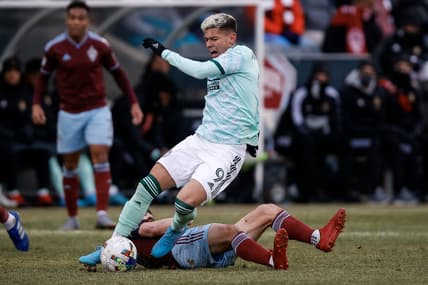 Mar 5, 2022; Commerce City, Colorado, USA; Atlanta United midfielder Matheus Rossetto (9) gets tripped up with Colorado Rapids midfielder Jack Price (19) in the first half at Dick's Sporting Goods Park. Mandatory Credit: Isaiah J. Downing-USA TODAY Sports