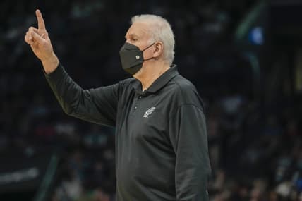 Mar 5, 2022; Charlotte, North Carolina, USA; San Antonio Spurs head coach Gregg Popovich signals during the second quarter against the Charlotte Hornets at the Spectrum Center. Mandatory Credit: Jim Dedmon-USA TODAY Sports