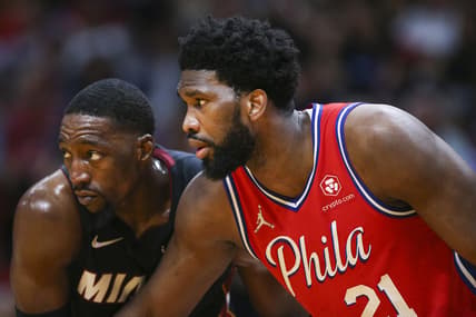 Mar 5, 2022; Miami, Florida, USA;  Philadelphia 76ers center Joel Embiid (21) battles for position against Miami Heat center Bam Adebayo (13) during the second quarter at FTX Arena. Mandatory Credit: Sam Navarro-USA TODAY Sports