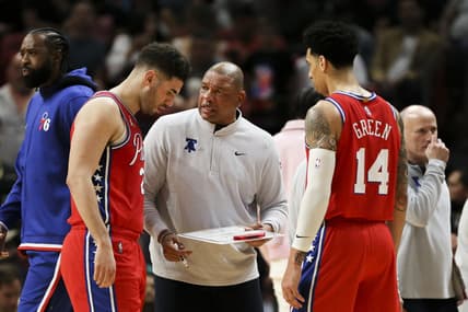 Mar 5, 2022; Miami, Florida, USA; Philadelphia 76ers head coach Doc Rivers talks to forward Georges Niang (20) and forward Danny Green (14) during a timeout in the fourth quarter against the Miami Heat at FTX Arena. Mandatory Credit: Sam Navarro-USA TODAY Sports