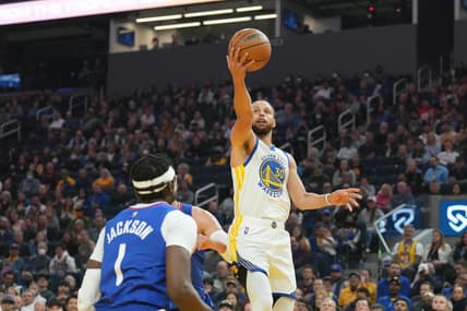 Mar 8, 2022; San Francisco, California, USA; Golden State Warriors guard Stephen Curry (30) scores during the first quarter against the LA Clippers at Chase Center. Mandatory Credit: Darren Yamashita-USA TODAY Sports