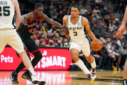 Mar 9, 2022; San Antonio, Texas, USA;  San Antonio Spurs forward Keldon Johnson (3) dribbles past Toronto Raptors forward Pascal Siakam (43) in the first half at the AT&T Center. Mandatory Credit: Daniel Dunn-USA TODAY Sports