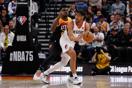Mar 9, 2022; Salt Lake City, Utah, USA; Portland Trail Blazers forward Trendon Watford (2) looks to pass the ball under pressure from Utah Jazz center Udoka Azubuike (20) in the fourth quarter at Vivint Arena. Mandatory Credit: Isaiah J. Downing-USA TODAY Sports