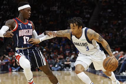 Mar 11, 2022; Houston, Texas, USA; Dallas Mavericks guard Trey Burke (3) controls the ball as Houston Rockets guard Dennis Schroder (17) defends during the third quarter at Toyota Center. Mandatory Credit: Troy Taormina-USA TODAY Sports
