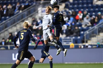 Mar 12, 2022; Philadelphia, Pennsylvania, USA; San Jose Earthquakes forward Benji Kikanovi   (28) and Philadelphia Union defender Nathan Harriel (26) go up for a header in the first half at Talen Energy Stadium. Mandatory Credit: Kyle Ross-USA TODAY Sports