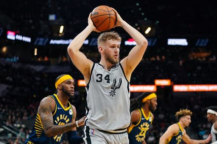 Mar 12, 2022; San Antonio, Texas, USA;  San Antonio Spurs center Jock Landale (34) gets a rebound in the first half against the Indiana Pacers at the AT&T Center. Mandatory Credit: Daniel Dunn-USA TODAY Sports
