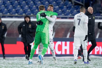 Mar 12, 2022; Foxborough, Massachusetts, USA; Real Salt Lake goalkeeper Zac MacMath (18) and forward Tate Schmitt (21) react after defeating the New England Revolution at Gillette Stadium. Mandatory Credit: Paul Rutherford-USA TODAY Sports