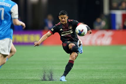Mar 13, 2022; Atlanta, Georgia, USA; Atlanta United defender Ronald Hernandez (2) kicks the ball against Charlotte FC during the first half at Mercedes-Benz Stadium. Mandatory Credit: Brett Davis-USA TODAY Sports